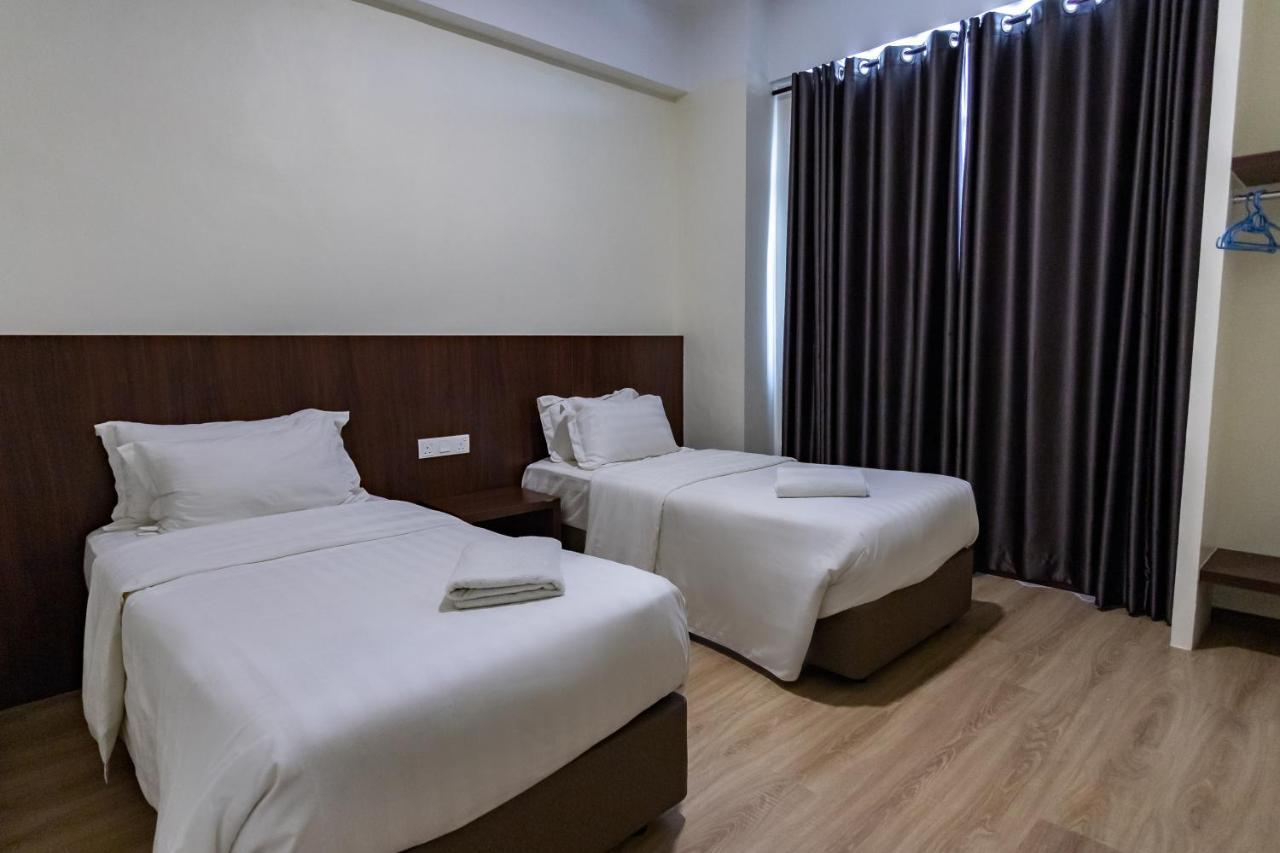 Emart Hotel 米里 外观 照片