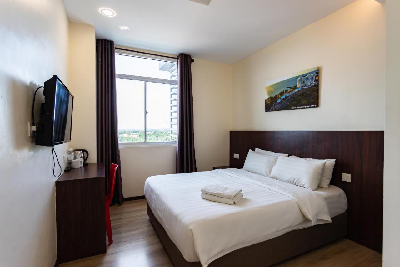 Emart Hotel 米里 外观 照片